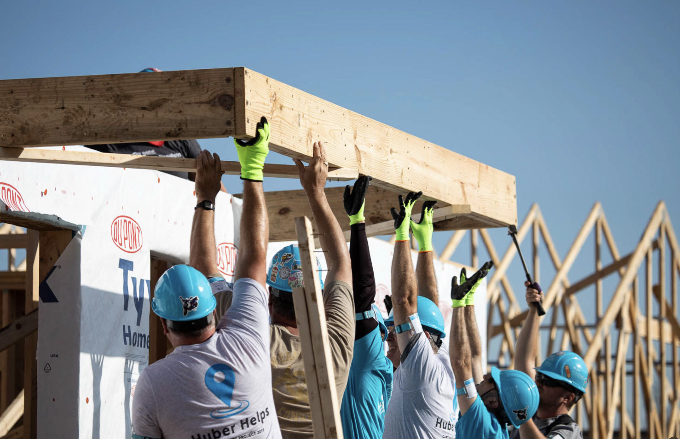 Volunteers building together